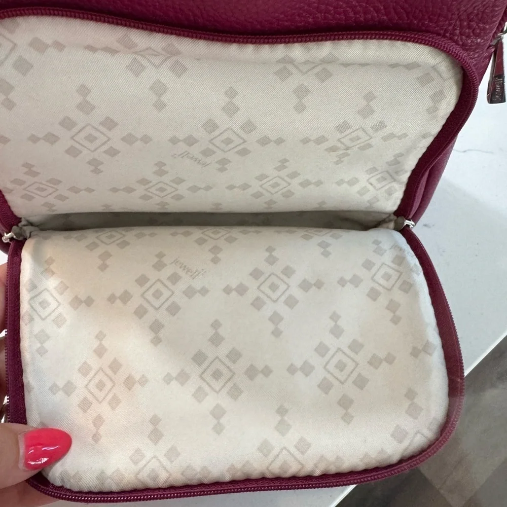 Jewell small backpack purse.  Purple in color. Good used condition.